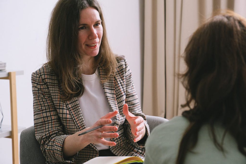 Business advisor offering tax debt advice to client